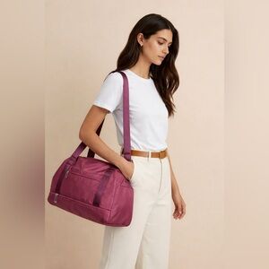 Cranberry color, travel bag for women
Brand new with tags